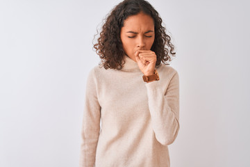 Poster - Young brazilian woman wearing turtleneck sweater standing over isolated white background feeling unwell and coughing as symptom for cold or bronchitis. Healthcare concept.