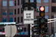 Signs and traffic lights help control traffic flow on downtown intersections of Boston.