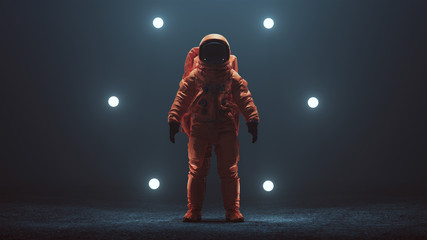 astronaut in an orange space suit with black visor standing in a alien void 3d illustration 3d rende