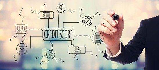 Wall Mural - Credit score theme with businessman on blurred abstract background