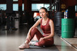 © Pixel-Shot - Sporty young woman in gym