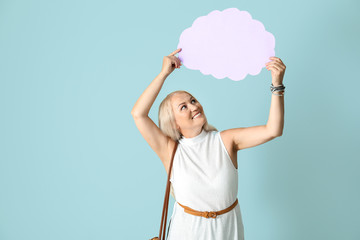 Poster - Mature woman with speech bubble on light background