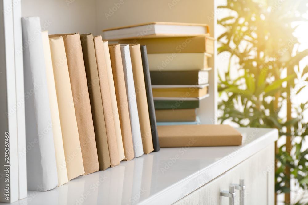 Many different books on shelf