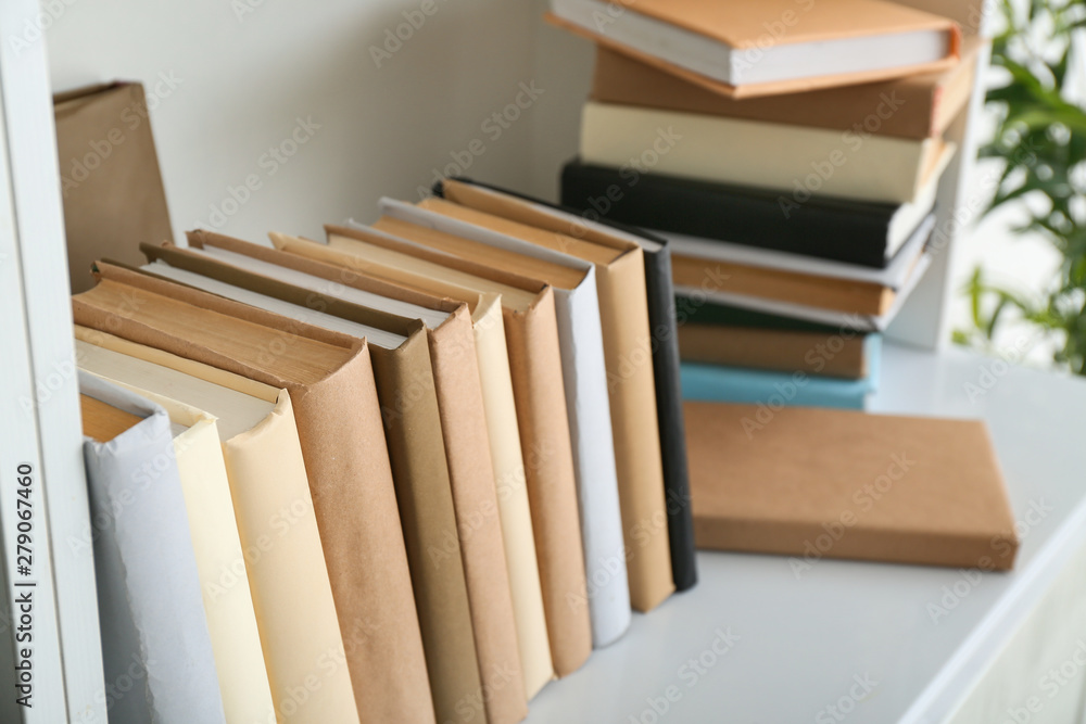 Many different books on shelf