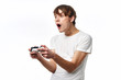 © SHOTPRIME STUDIO - portrait of young man with remote control