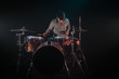 © puhimec - musician playing drums, black background and beautiful soft light
