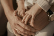 © Евгений Сагунов - hands of woman with hands of child