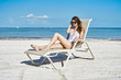 © SHOTPRIME STUDIO - woman relaxing on beach