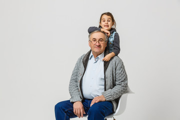 Wall Mural - Senior man and granddaughter