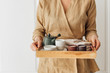 © LUMINA IMAGES - Spa Therapist Holding Tea Tray