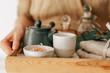 © LUMINA IMAGES - Midsection of spa therapist holding tea tray