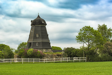 Wall Mural - Old windmill converted to living house or apartments in Sweden