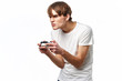 © SHOTPRIME STUDIO - young man with joystick playing video games