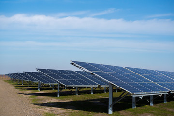 Wall Mural - solar panel on sky background