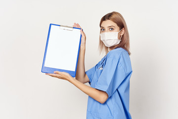 young female doctor with clipboard