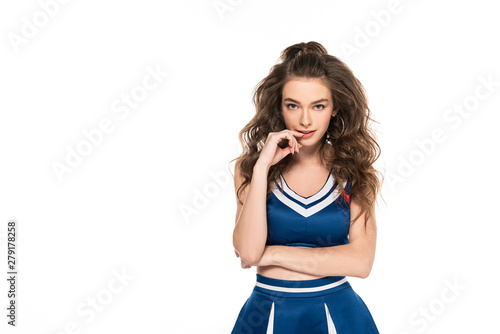 Fotografía sexy seductive cheerleader girl in blue uniform touching lips isolated on white