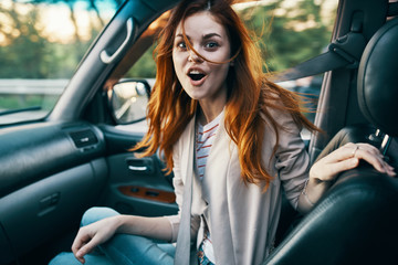 Wall Mural - young woman in car