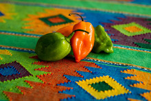 Three Habanero Chile Peppers On Table