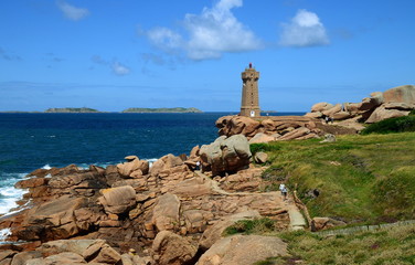 Wall Mural - View at the The Ploumanac'h Lighthouse (officially the Mean Ruz Lighthouse) situated at the Pink Granite Coast or Cote de Granite Rose in Brittany, France