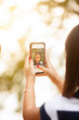 © Cavan for Adobe - Girl (8-9) taking selfie with smartphone