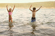 © Cavan for Adobe - Friends (8-9) having fun in river