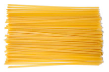 Raw Pasta Tagliatelle, Spaghetti, Isolated On White Background. Top View.