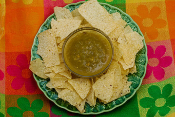 Overhead View of Tortilla Chips with Bowl of Green Chili Dip