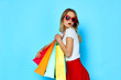 © SHOTPRIME STUDIO - young woman with shopping bags