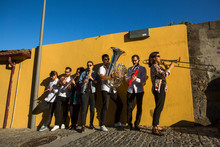 Streets Musicians Play Music In The Street Of Old Downtown, Portugal.