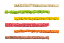 Set Of Colorful Dyed Rawhide Sticks For Dog Treat Isolated On White Background