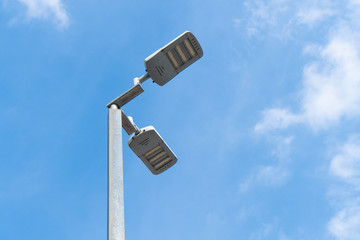 Street light with blue sky.