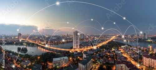 Valokuvatapetti Smart city and wireless communication network concept