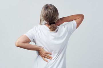 senior woman with back pain