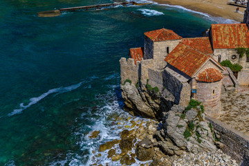 Aerial view of Budva Old Town from the Citadel with Richard s Head beach and Adriatic Sea in Montenegro, Balkans..