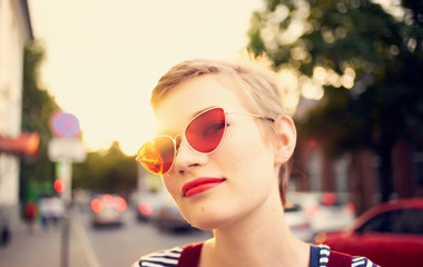 Wall Mural - portrait of young woman in sunglasses