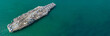 Leinwandbild Motiv Aerial view American navy nuclear aircraft carrier view from above, Military army navy ship carrier airplane full loading fighter jet aircraft, Copy space. for banner web.
