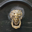 Beautiful ancient door knob in Rome, Italy.