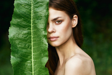 woman with perfect skin with leaf