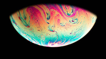 abstract colorful planet on black background