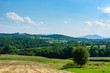 a view on hills, mountains and fields sunny day in Małopolska, poland 
