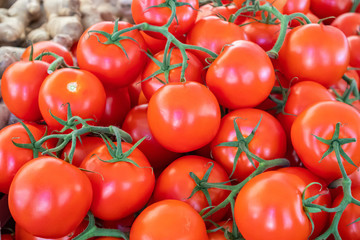 Canvas Print - Tomatoes pile at farmers market, background, texture