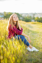 Young beautiful woman outdoor.