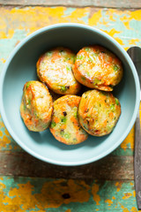 Wall Mural - Vegetarian fritters with peas & carrots 