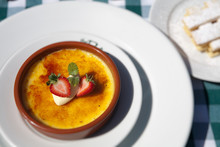 Creme Brulee With Strawberries And Cream And Shortbread
