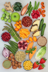 Alkaline health food selection of vegetables, fruit, herbs, spice, whole wheat grain, legumes, wheat grass powder, nuts and seeds. High in omega 3, antioxidants, anthocyanins, fibre and vitamins.