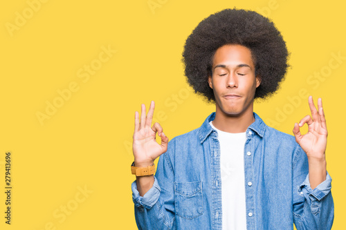 Young African American Man With Afro Hair Relax And Smiling With