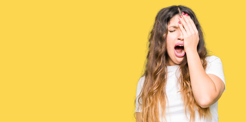 Poster - Young beautiful woman wearing casual white t-shirt Yawning tired covering half face, eye and mouth with hand. Face hurts in pain.