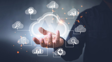 Leinwandbilder - Big data analytics and business intelligence concept with chart and graph icons on a digital screen interface and a businessman in background