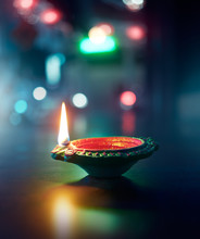 Happy Diwali - Lit Diya Lamp On Street At Night