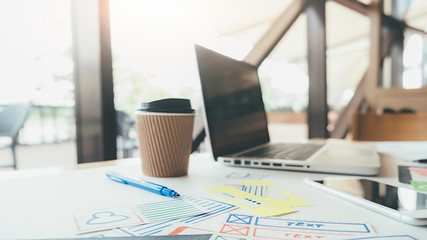 Creative Web Designer planning application and developing template layout, framework for mobile phone. User experience (UX) concept.